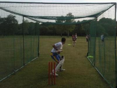 Lee Kerley having a net on the outfield